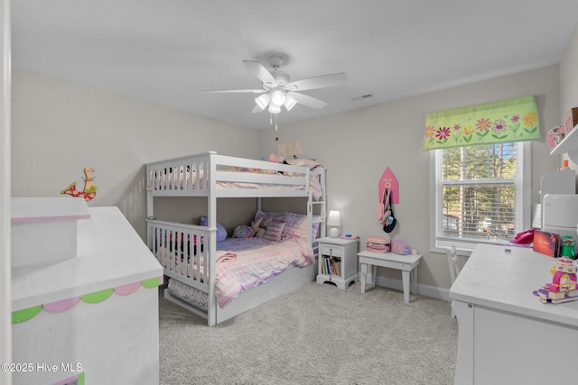 bedroom featuring light carpet and ceiling fan