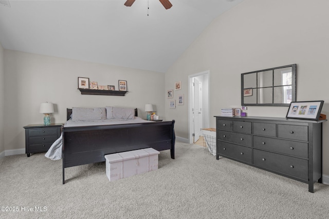 carpeted bedroom with high vaulted ceiling and ceiling fan