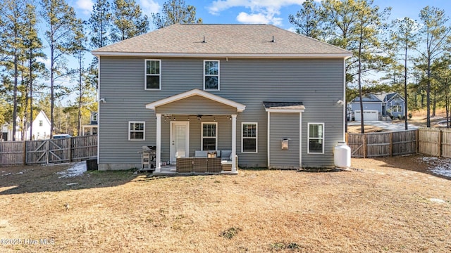 451 Gretchen Rd, West End, NC 27376 - back of property featuring a ceiling fan, a fenced backyard, a patio, an outdoor hangout area, and roof with shingles