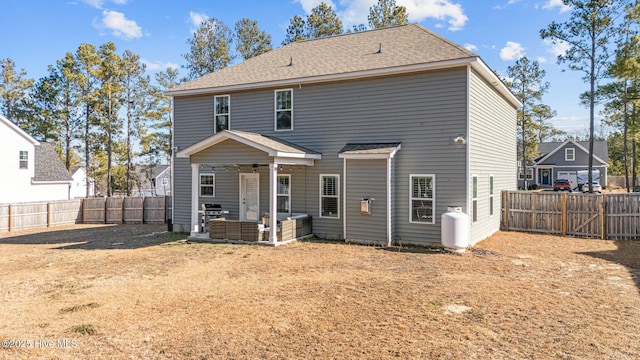 451 Gretchen Rd, West End, NC 27376 - rear view of property featuring a patio area, a fenced backyard, ceiling fan, and an outdoor living space
