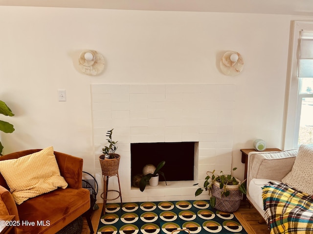 living room featuring a fireplace