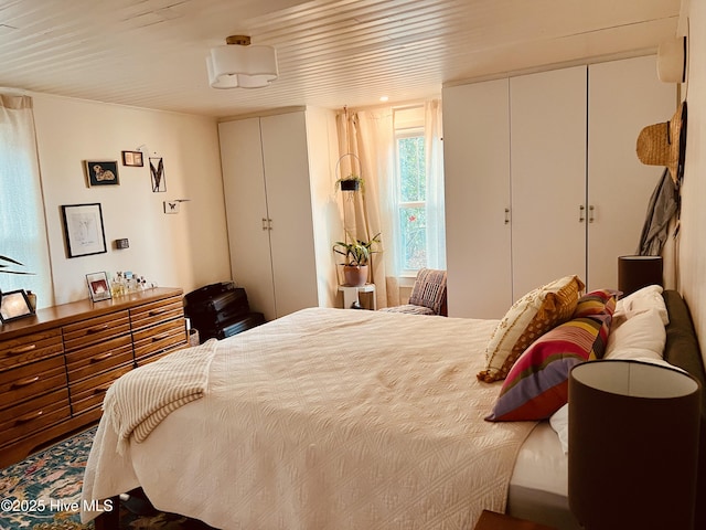 bedroom with multiple closets