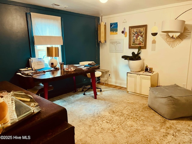 home office with wood-type flooring