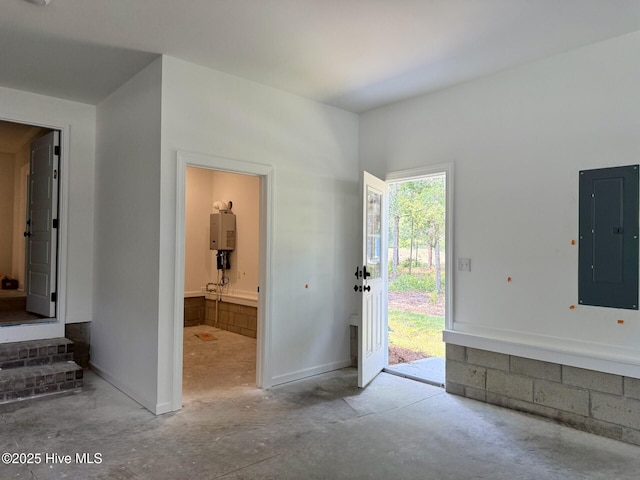 3387 Four Water Ln SW, Supply, NC 28462 - foyer entrance featuring electric panel, concrete floors, water heater, and baseboards