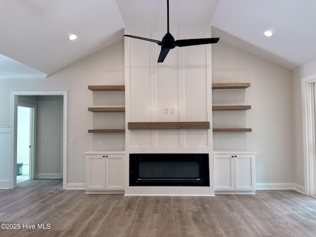 3387 Four Water Ln SW, Supply, NC 28462 - unfurnished living room featuring lofted ceiling, light wood-type flooring, a fireplace, a ceiling fan, and baseboards