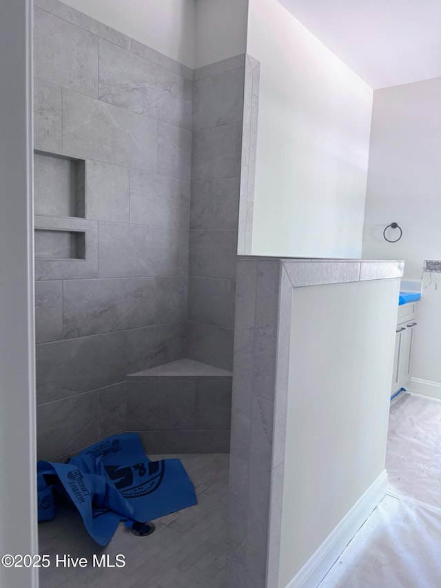 bathroom featuring baseboards