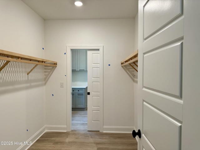 3387 Four Water Ln SW, Supply, NC 28462 - spacious closet featuring wood finished floors