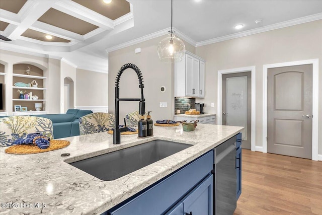 kitchen featuring sink, dishwasher, light stone countertops, white cabinets, and light wood-type flooring