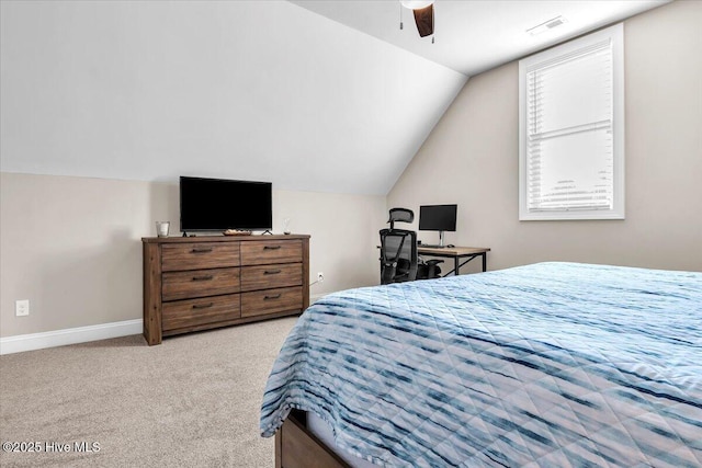 carpeted bedroom featuring vaulted ceiling and ceiling fan