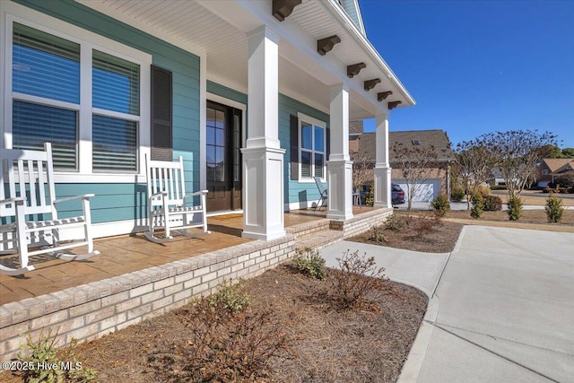 doorway to property with a porch