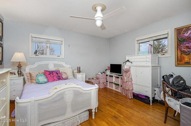 bedroom featuring ceiling fan and light wood-type flooring