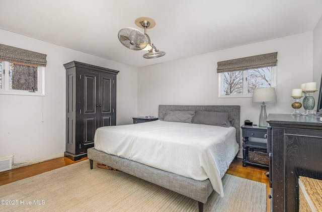 bedroom featuring hardwood / wood-style floors