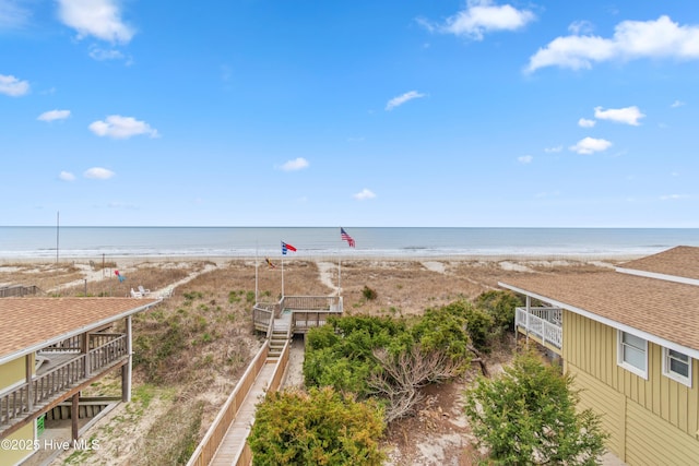 water view featuring a beach view