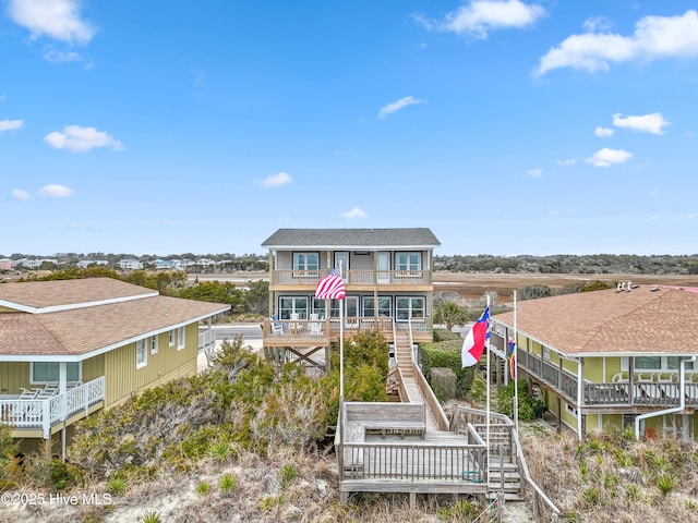 view of front of home with a balcony