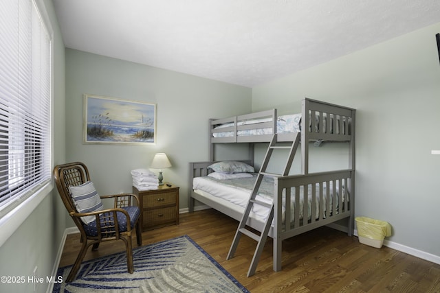 bedroom featuring dark hardwood / wood-style floors