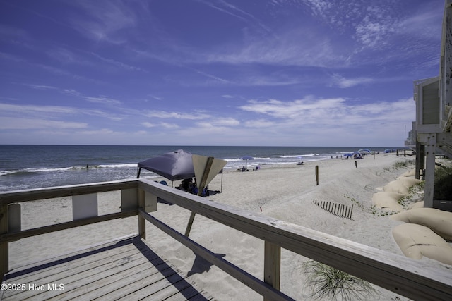 property view of water featuring a beach view