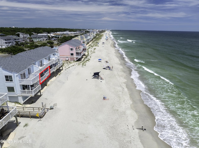 aerial view featuring a water view and a beach view