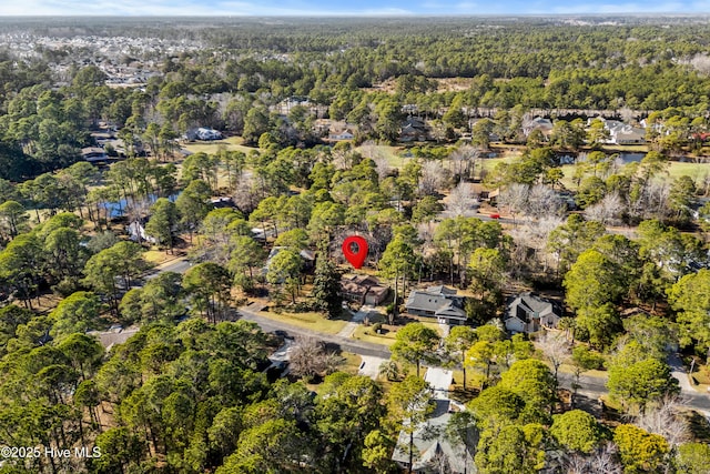 aerial view featuring a view of trees