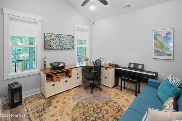 1611 Golfers Ridge Dr SE, Bolivia, NC 28422 - home office featuring wood finished floors, a ceiling fan, vaulted ceiling, and healthy amount of natural light