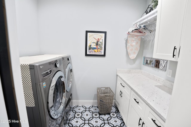 1611 Golfers Ridge Dr SE, Bolivia, NC 28422 - laundry area featuring washer and clothes dryer, cabinet space, and tile patterned floors