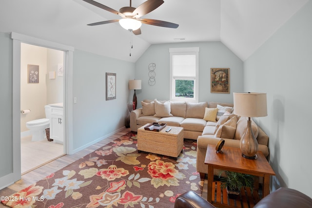 1611 Golfers Ridge Dr SE, Bolivia, NC 28422 - living room featuring ceiling fan, light wood-style flooring, and vaulted ceiling