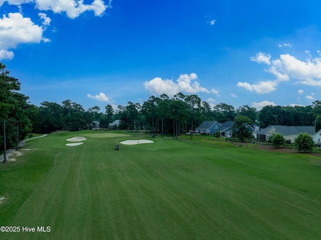 1611 Golfers Ridge Dr SE, Bolivia, NC 28422 - view of property's community with view of scattered trees, view of golf course, and a yard