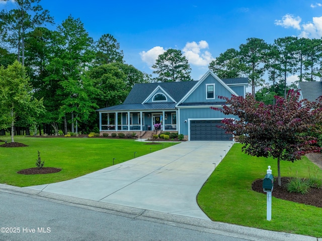 1611 Golfers Ridge Dr SE, Bolivia, NC 28422 - view of front facade featuring covered porch, driveway, an attached garage, and a front lawn