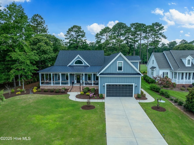 1611 Golfers Ridge Dr SE, Bolivia, NC 28422 - view of front of house featuring covered porch, board and batten siding, concrete driveway, and a front yard