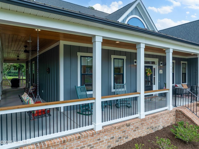 1611 Golfers Ridge Dr SE, Bolivia, NC 28422 - view of side of property with board and batten siding, a porch, a shingled roof, and a ceiling fan