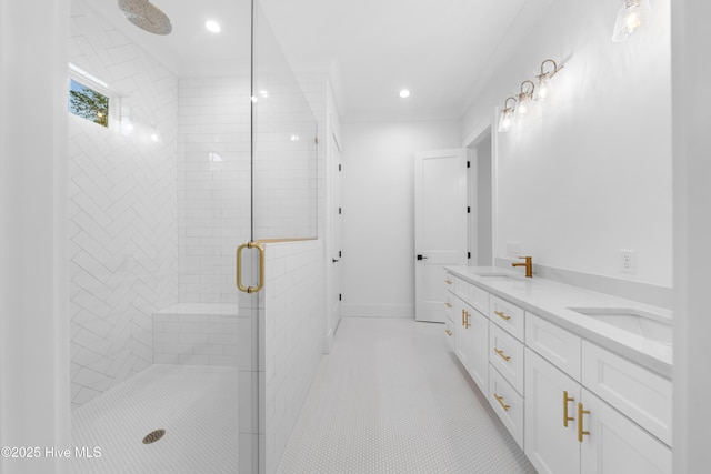 bathroom featuring vanity, tile patterned floors, and walk in shower