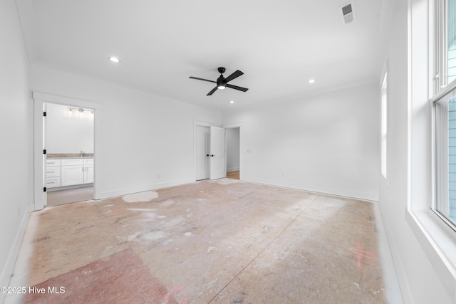 unfurnished room with crown molding and ceiling fan