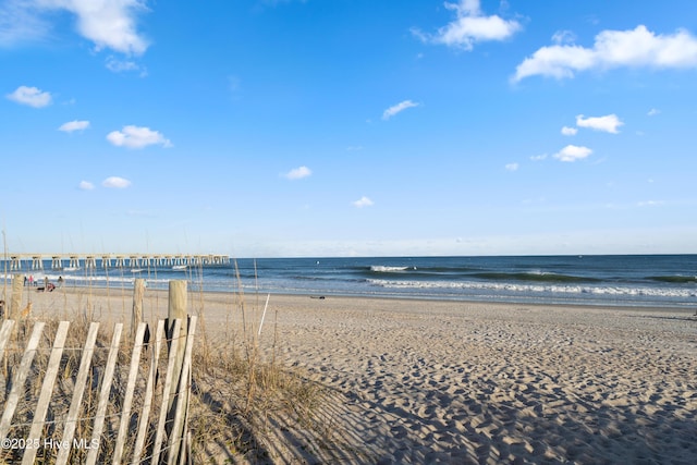 property view of water featuring a beach view