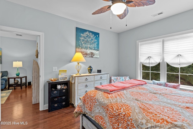 bedroom featuring dark wood-type flooring and ceiling fan