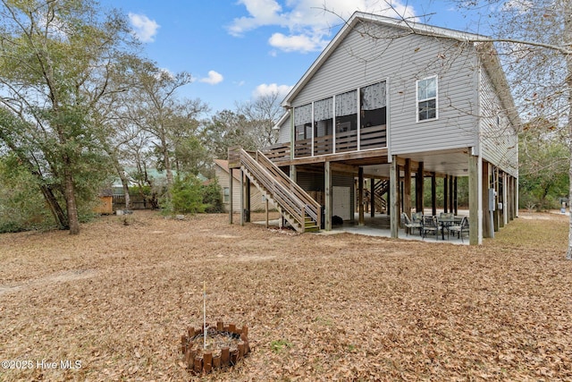 back of house featuring a patio