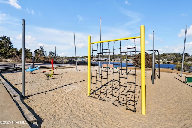 view of property's community with a playground