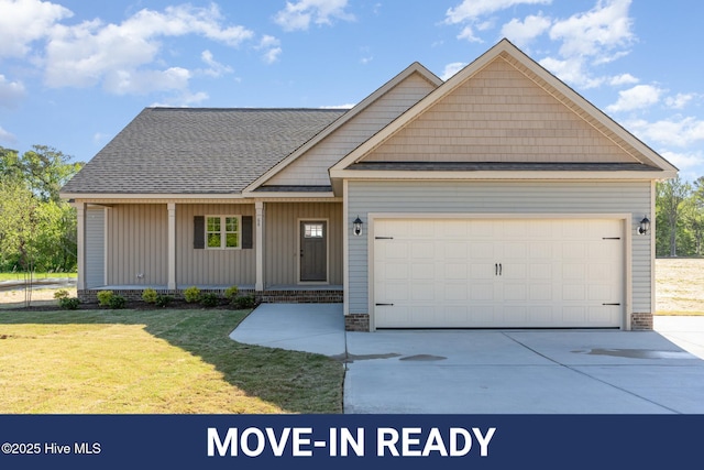 68 Tee Dr, Selma, NC 27576 - view of front of home with roof with shingles, driveway, a porch, a garage, and a front yard