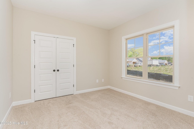 68 Tee Dr, Selma, NC 27576 - empty room with baseboards and carpet flooring