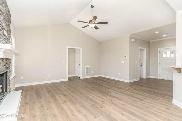 68 Tee Dr, Selma, NC 27576 - unfurnished living room featuring a fireplace, visible vents, light wood finished floors, and ceiling fan