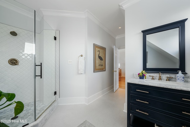 full bathroom featuring baseboards, a shower stall, vanity, and crown molding