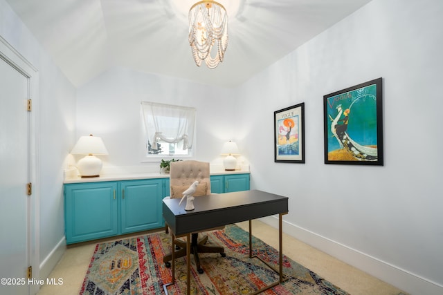 office area featuring light colored carpet, an inviting chandelier, baseboards, and lofted ceiling