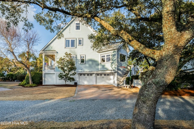 view of front of property featuring driveway and an attached garage