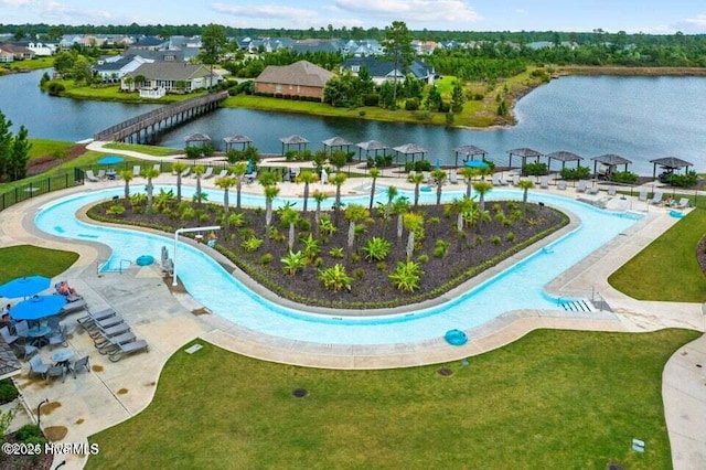 bird's eye view with a water view