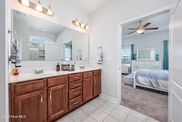 bathroom featuring vanity, tile patterned floors, and ceiling fan