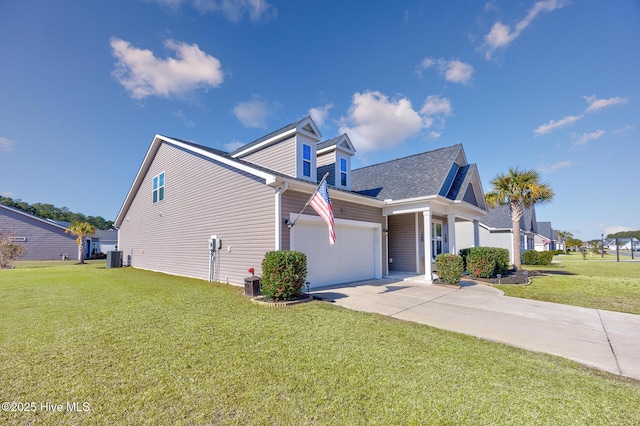 view of home's exterior featuring a garage and a lawn