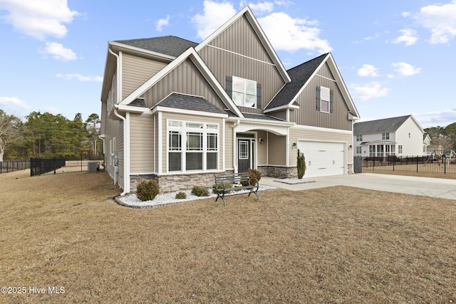 craftsman-style home with a garage, a front yard, and central air condition unit