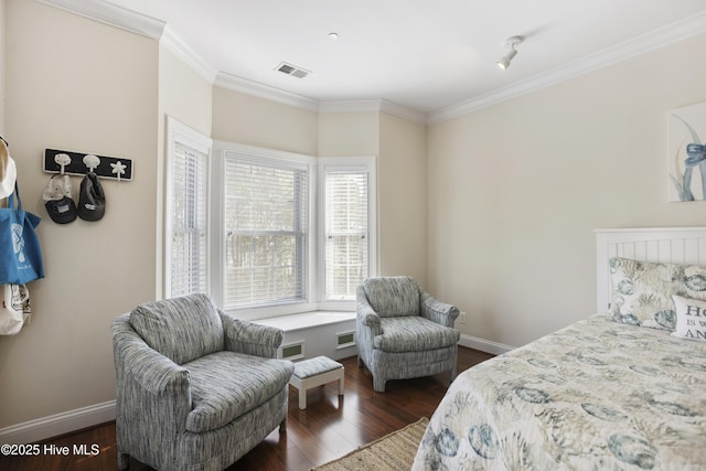 bedroom with dark wood-type flooring and crown molding