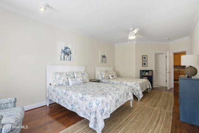 bedroom with crown molding, dark hardwood / wood-style floors, and ceiling fan