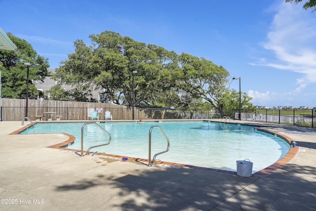 view of pool featuring a patio