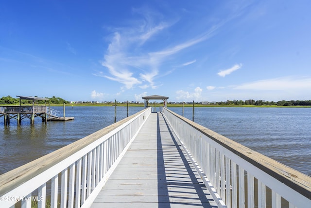 view of dock with a water view