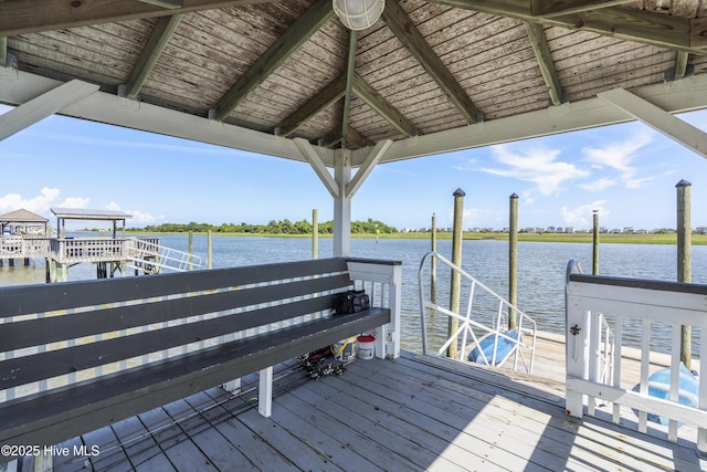 dock area with a water view